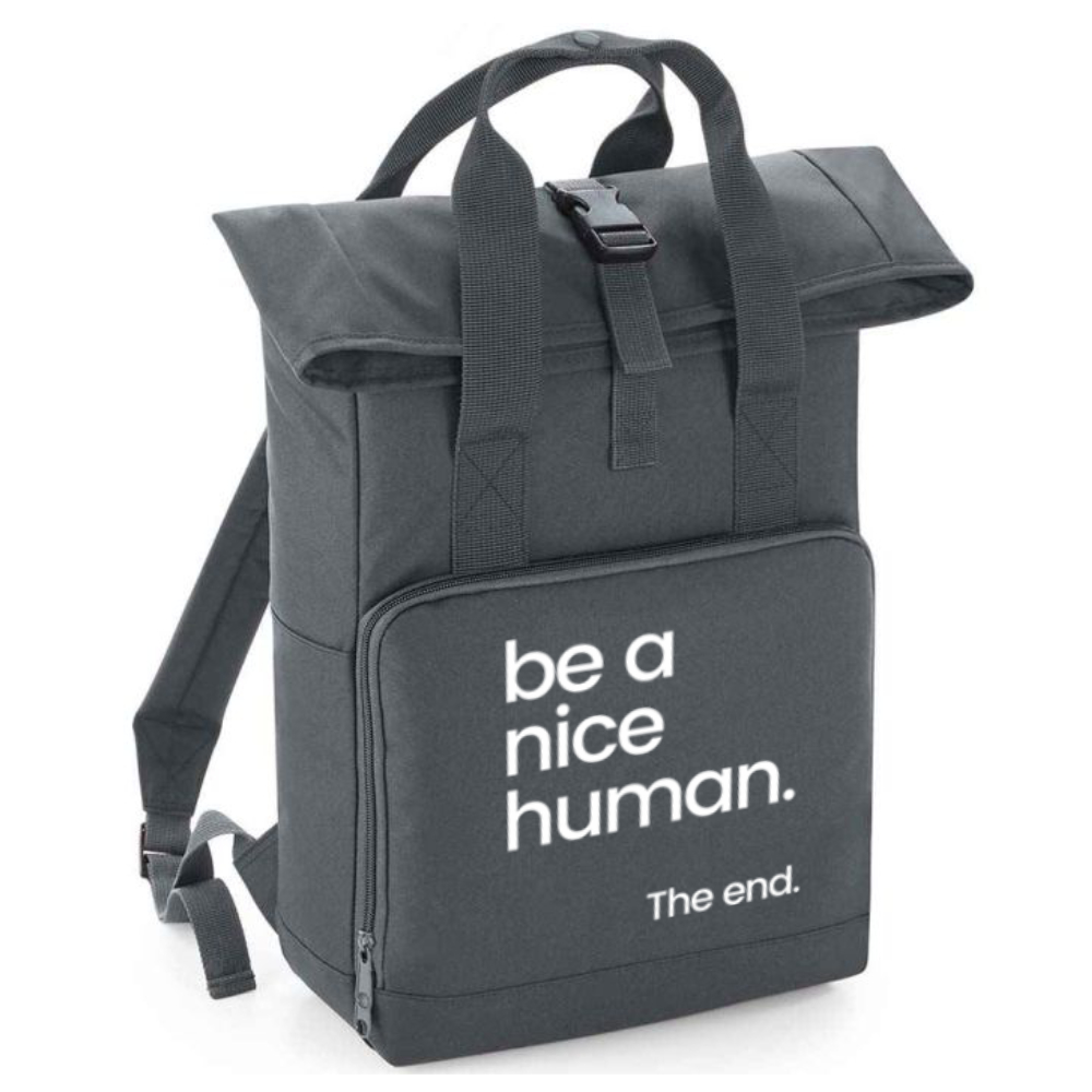 Black roll top back pack with be a nice human in white writing